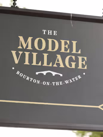The Model Village sign in Bourton-on-the-Water