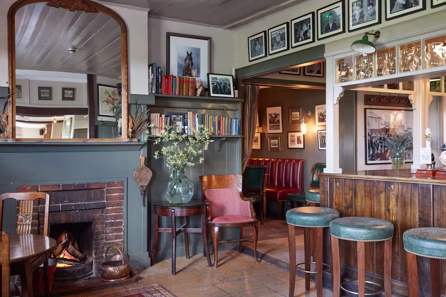 Young's pub interior with fireplace and leather seating