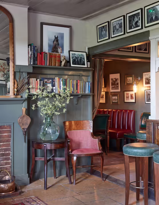 Young's pub interior with fireplace and leather seating