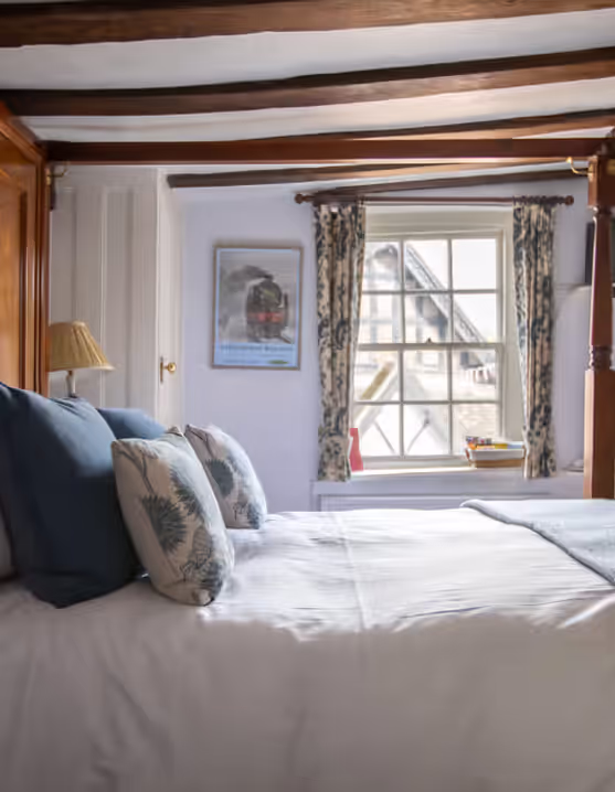 four poster bed in a Young's bedroom