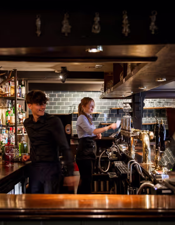 Young's bartenders preparing drinks