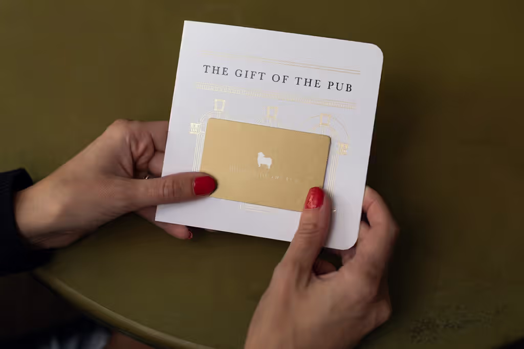 person holding a Young's gift card