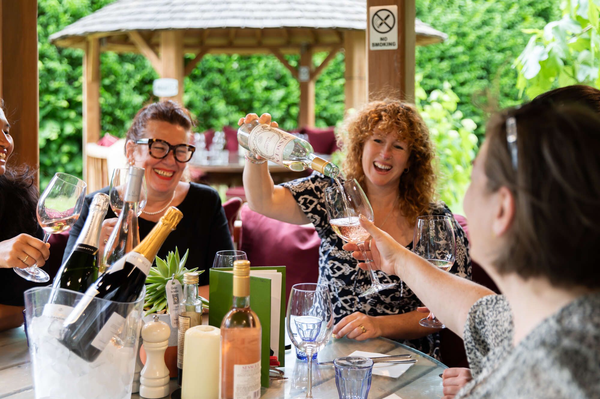 Drinks flowing in a garden hut at the Carpenter's Arms, Tonbridge Kent