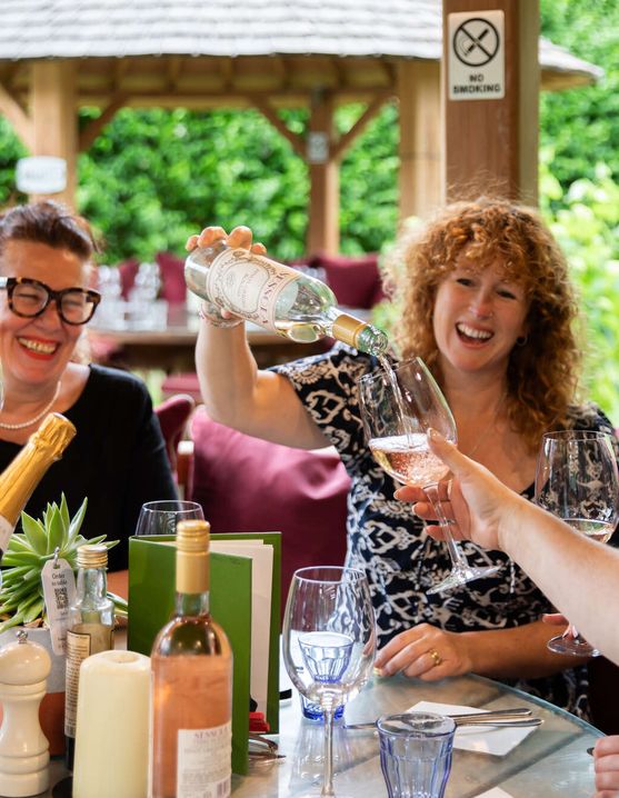 Drinks flowing in a garden hut at the Carpenter's Arms, Tonbridge Kent